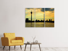 Laden Sie das Bild in den Galerie-Viewer, Leinwandbild 3-teilig Skyline im Abendlicht