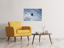 Laden Sie das Bild in den Galerie-Viewer, Leinwandbild Ein Satellit über den Wolken