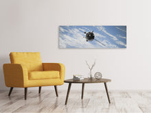 Laden Sie das Bild in den Galerie-Viewer, Leinwandbild Panorama Ein Satellit über den Wolken