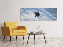 Laden Sie das Bild in den Galerie-Viewer, Leinwandbild Panorama Ein Satellit über den Wolken