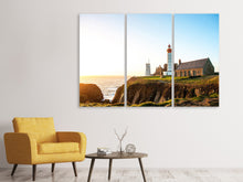 Laden Sie das Bild in den Galerie-Viewer, Leinwandbild 3-teilig Der Leuchtturm bei Sonnenaufgang