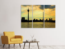 Laden Sie das Bild in den Galerie-Viewer, Leinwandbild 3-teilig Skyline im Abendlicht