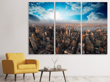 Laden Sie das Bild in den Galerie-Viewer, Leinwandbild 3-teilig Skyline Über den Dächern von Manhattan