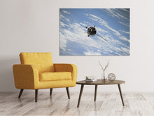 Laden Sie das Bild in den Galerie-Viewer, Leinwandbild Ein Satellit über den Wolken