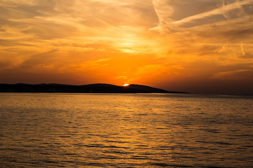 Fototapete Die Sonne geht unter