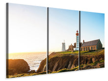 Laden Sie das Bild in den Galerie-Viewer, Leinwandbild 3-teilig Der Leuchtturm bei Sonnenaufgang